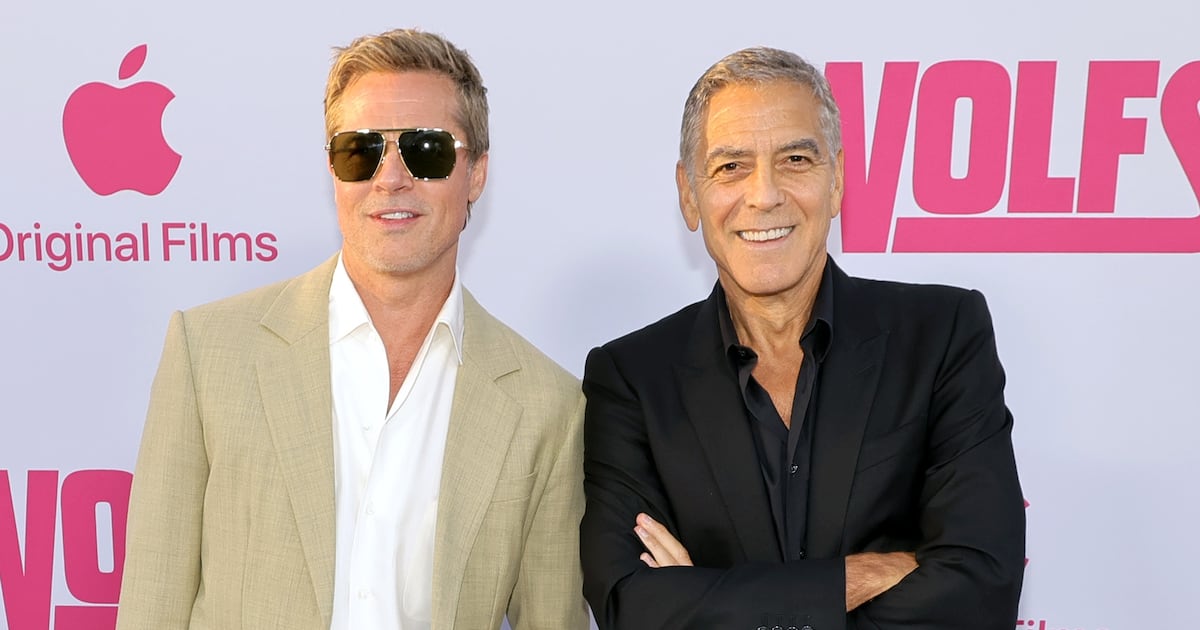 HOLLYWOOD, CALIFORNIA - SEPTEMBER 18: (L-R) Brad Pitt and George Clooney attend the premiere of the Los Angeles Premiere of the Apple Original Film "Wolfs" at TCL Chinese Theatre on September 18, 2024 in Hollywood, California.