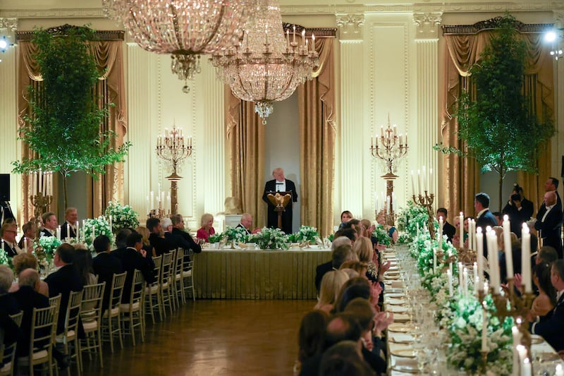 U.S. President Donald Trump speaks during a state dinner for Britain's King Charles and Queen Camilla at the White House in Washington, D.C., U.S., April 28, 2026. REUTERS/Suzanne Plunkett