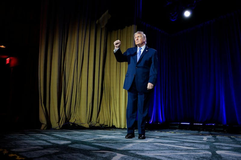 President Donald Trump raises his fist as he departs the Faith & Freedom Coalition's 2026 Policy Conference at the Washington Hilton, in Washington, D.C. on June 26, 2026.