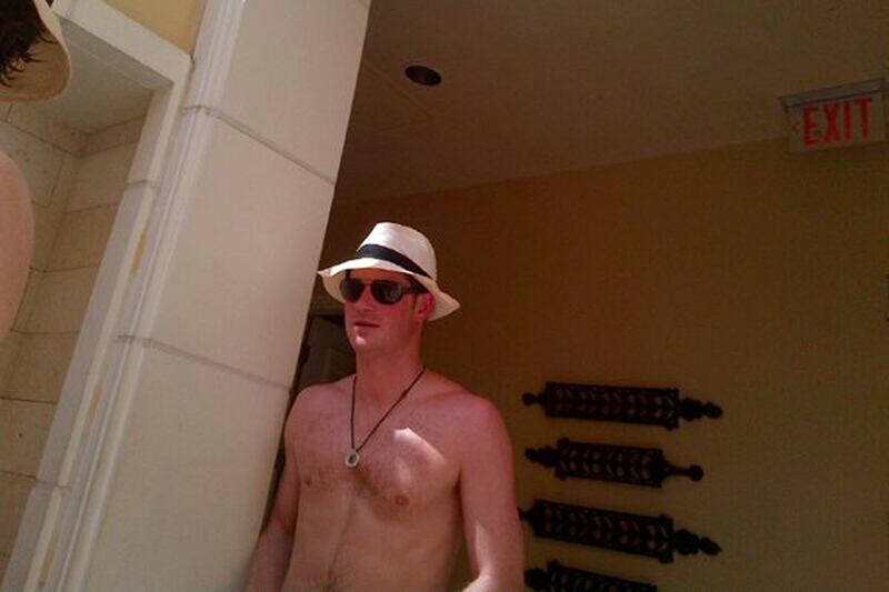 articles/2013/03/26/prince-harry-coming-back-to-america/prince-harry-shirtless-royalist-sykes_asqne6