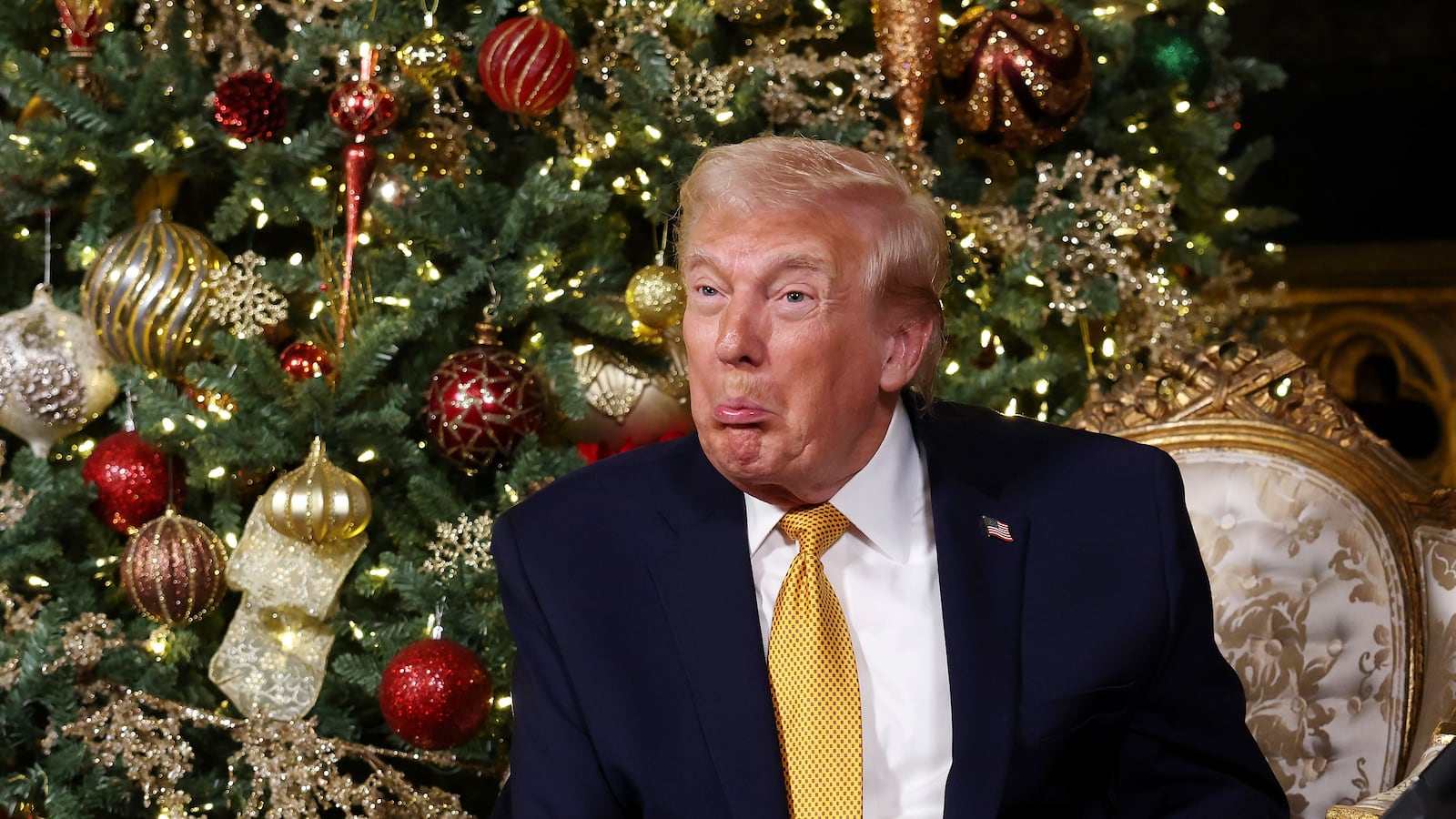 PALM BEACH, FLORIDA - DECEMBER 24: U.S. President Donald Trump calls children as he participates in tracking Santa Claus' movements with the North American Aerospace Defense Command (NORAD) Santa Tracker on Christmas Eve at the Mar-a-Lago resort on December 24, 2025 in Palm Beach, Florida. This is the 70th year that NORAD has publicly tracked Santa’s sleigh on its global rounds. (Photo by Tasos Katopodis/Getty Images)