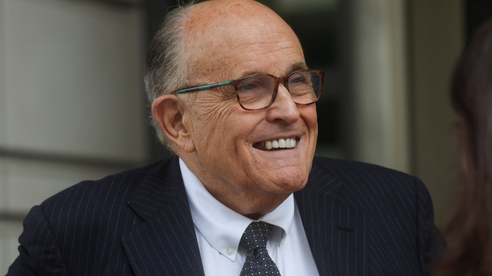 Rudy Giuliani exits U.S. District Court after attending a hearing in a defamation suit related to the 2020 election results at the federal courthouse in Washington, U.S., May 19, 2023.