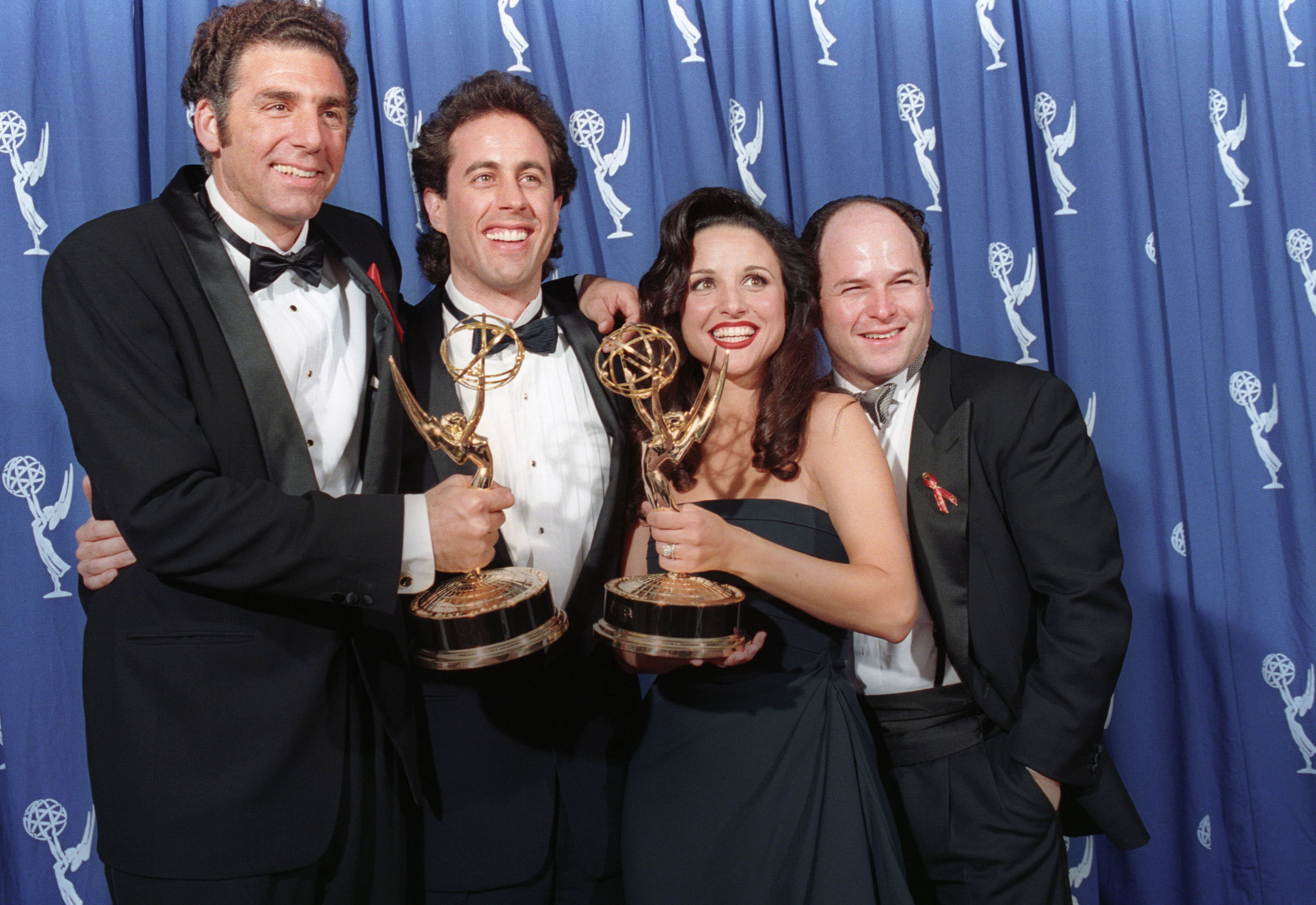 The cast of the NBC TV series "Seinfeld" pose together after "Seinfeld" won outstading comedy series