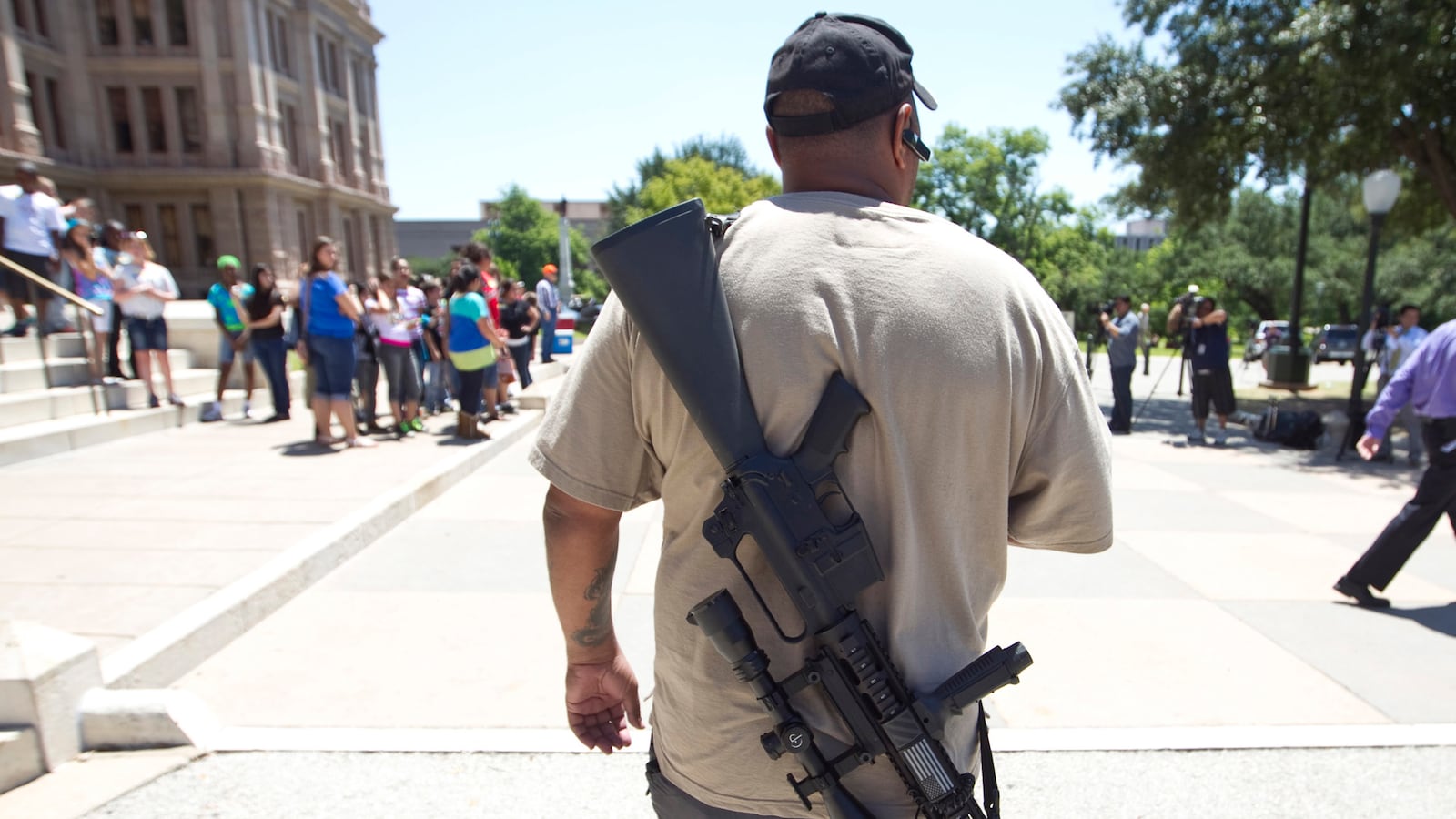 articles/2014/06/12/a-gun-owner-speaks-my-case-for-open-carry/140611-grisham-open-carry-tease_o5decu