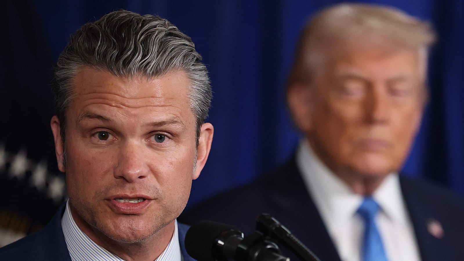 PALM BEACH, FLORIDA - JANUARY 03: U.S. Secretary of War Pete Hegseth speaks during a press conference with U.S. President Donald Trump at Mar-a-Lago club on January 03, 2026, in Palm Beach, Florida. During the event, President Trump confirmed that the U.S. military carried out a large-scale strike in Caracas overnight, resulting in the capture of Venezuelan leader Nicolas Maduro and his wife, Cilia Flores. (Photo by Joe Raedle/Getty Images)