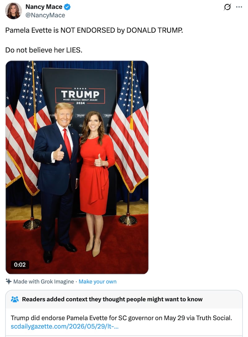 An AI-generated video of Donald Trump and Nancy Mace standing next to each other while giving the thumbs up.