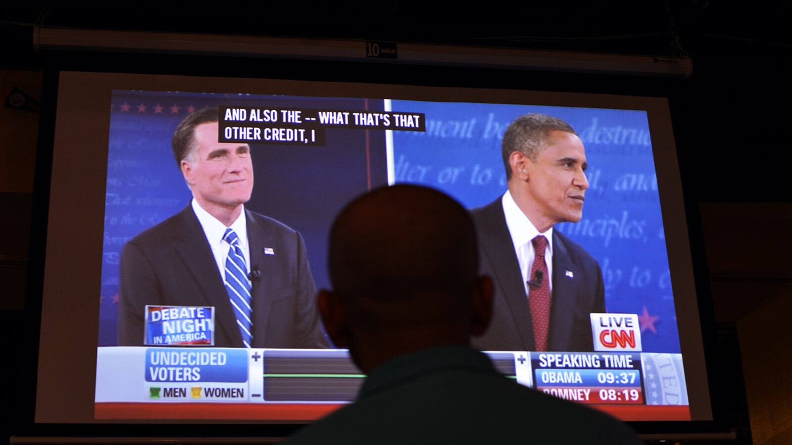 articles/2012/10/17/the-sound-of-chugging-kool-aid/debate-people-watching-freedlander_o5gwdm