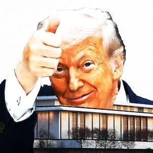 Donald Trump with a thumbs up behind the Kennedy Center