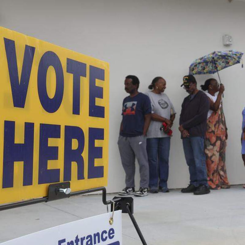 People wait in line to vote on the first day of early voting on Tuesday, May 26, 2026, at the Richland County Voter Registration office in South Carolina as state lawmakers killed an effort to redistrict for now.
