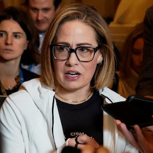 Kyrsten Sinema speaks to reporters