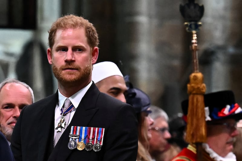 Britain's Prince Harry, Duke of Sussex looks on as Britain's King Charles III leaves Westminster Abbey after the Coronation Ceremonies in central London on May 6, 2023. - The set-piece coronation is the first in Britain in 70 years, and only the second in history to be televised. Charles will be the 40th reigning monarch to be crowned at the central London church since King William I in 1066. Outside the UK, he is also king of 14 other Commonwealth countries, including Australia, Canada and New Zealand.     BEN STANSALL/Pool via REUTERS