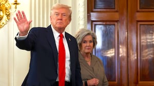 President Donald Trump departs with White House Chief of Staff Susie Wiles in the State Dining Room of the White House on October 08, 2025 in Washington, DC.