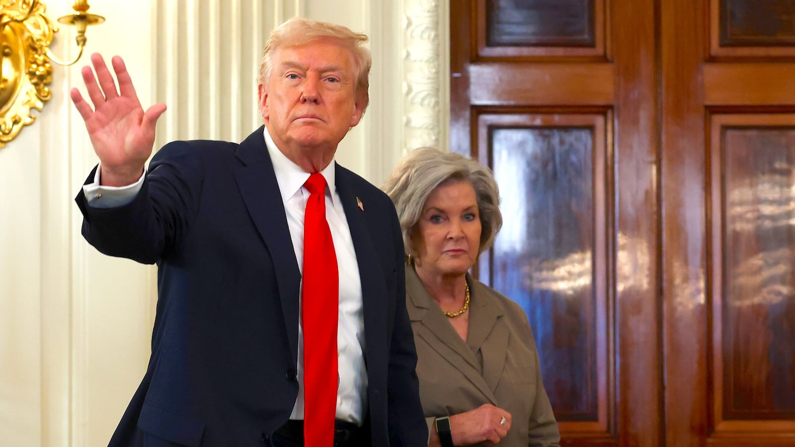 President Donald Trump departs with White House Chief of Staff Susie Wiles in the State Dining Room of the White House on October 08, 2025 in Washington, DC.