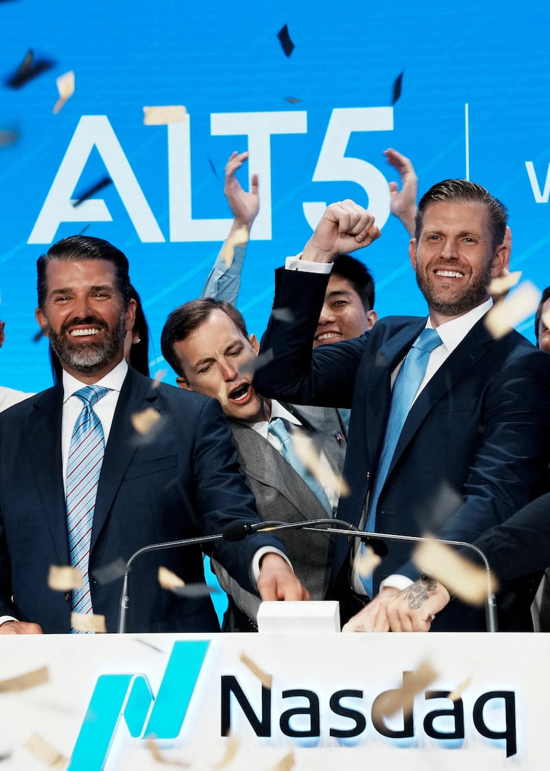 Zach Witkoff, Co-Founder and CEO of World Liberty Financial, Donald Trump Jr. and Eric Trump ring the opening bell to celebrate the closing of ALT5’s $1.5 billion offering and adoption of its $WLFI Treasury Strategy at the Nasdaq Market, in New York City, U.S., August 13, 2025.  REUTERS/Eduardo Munoz