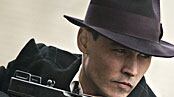 articles/2009/06/30/public-enemies-true-crimes/masters-johnny-depp_35042_f6lk7x