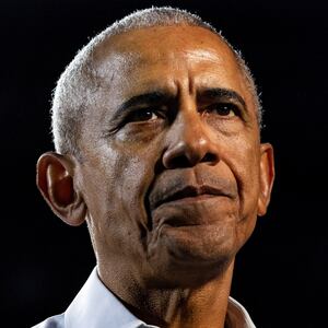 Former U.S. President Barack Obama pauses for a moment as he speaks to the crowd during a campaign event for Democratic presidential nominee and U.S. Vice President Kamala Harris, during the first week of early voting in Detroit, Michigan, U.S. October 22, 2024.  REUTERS/Emily Elconin