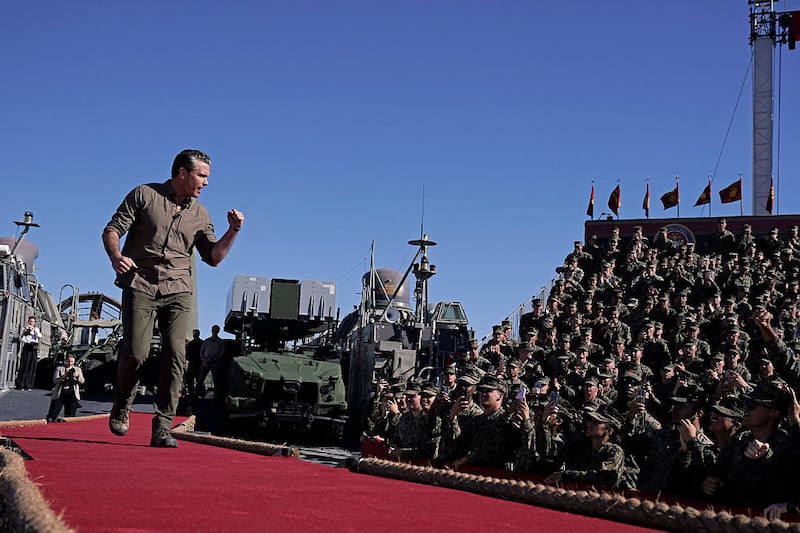US Secretary of Defense Pete Hegseth walks on stage to deliver remarks as part of the Marine Corps' 250th anniversary celebration at Camp Pendleton, California, on October 18, 2025.