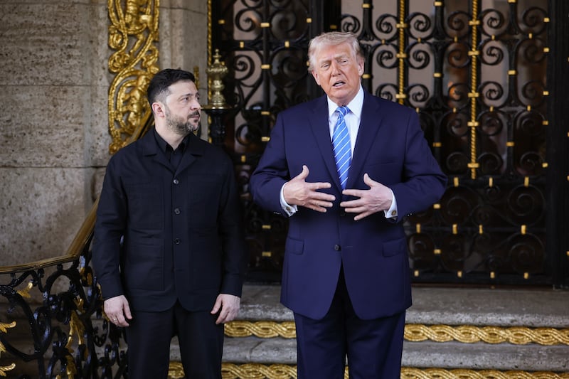 PALM BEACH, FLORIDA - DECEMBER 28: U.S. President Donald Trump greets Ukrainian President Volodymyr Zelensky at his Mar-a-Lago club on December 28, 2025 in Palm Beach, Florida. Trump invited Zelensky to his private club to work on a U.S.-proposed peace plan to end the war in Ukraine as the conflict approaches four years since the sudden full-scale invasion by Russia on February 24, 2022. (Photo by Joe Raedle/Getty Images)