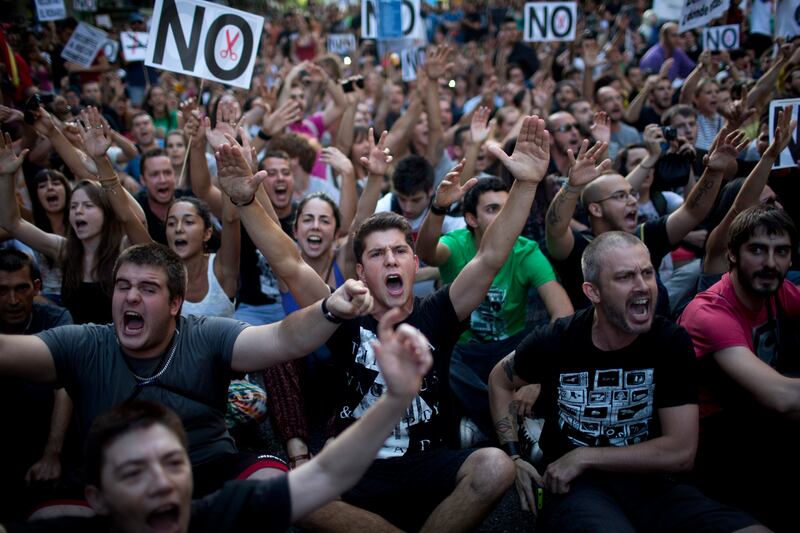 articles/2012/07/14/spain-s-austerity-hits-the-people-but-not-the-pols/elkin-spain-austerity-embed_isbnkg