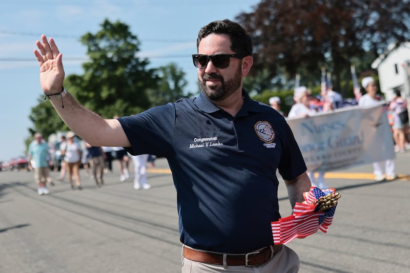 Rep. Mike Lawler, pictured at a Fourth of July parade, is trailing his Democratic challenger, according to a new poll.