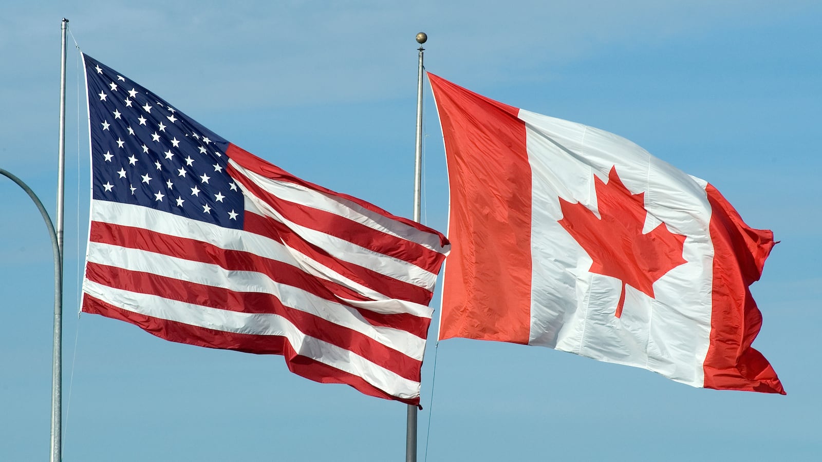 American and Canadian flags