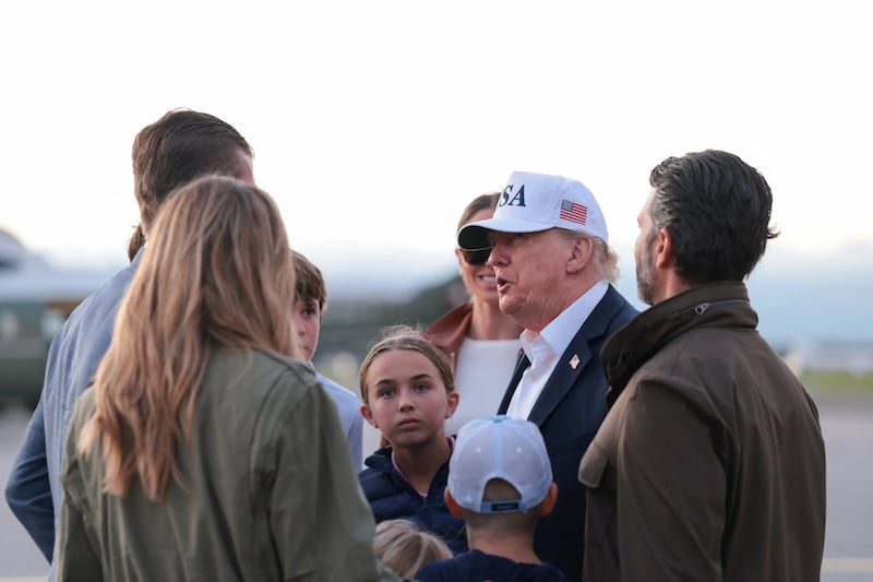 U.S. President Donald Trump stands with Eric Trump, Lara Trump, Donald Trump Jr. and Bettina Anderson, at Shannon Airport in Ireland, September 13, 2026.