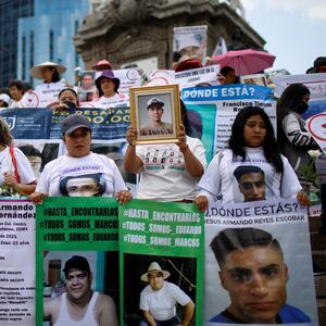 Relatives of missing people take part in a protest for victims in Mexico City.
