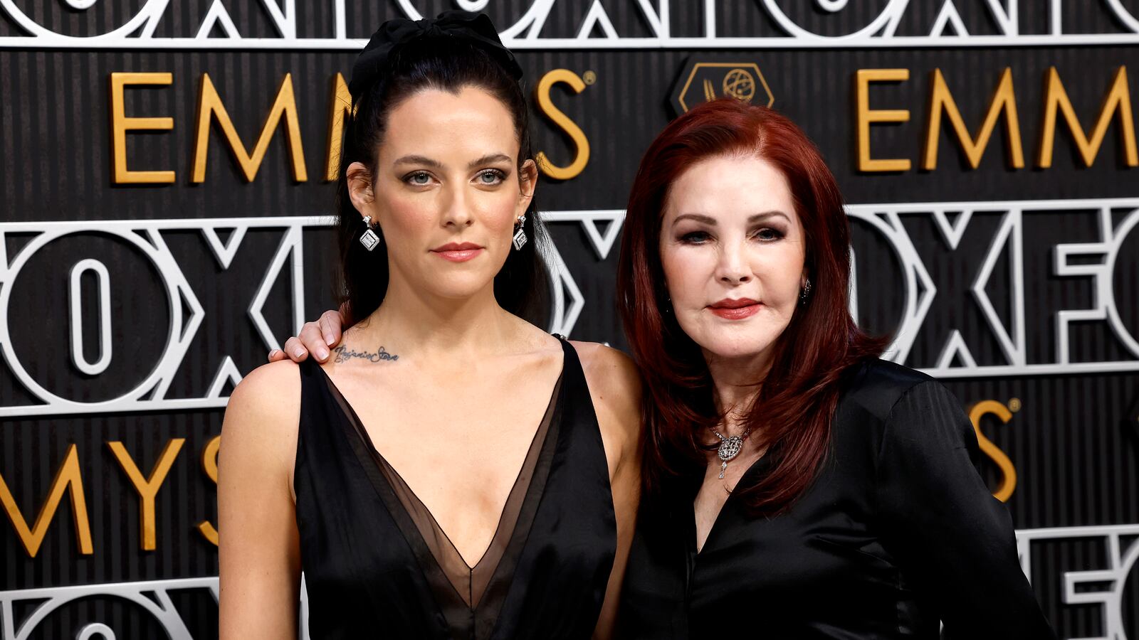 A photo of Riley Keough and Priscilla Presley on the way in to attend the 75th Primetime Emmy Awards on Monday in Los Angeles.