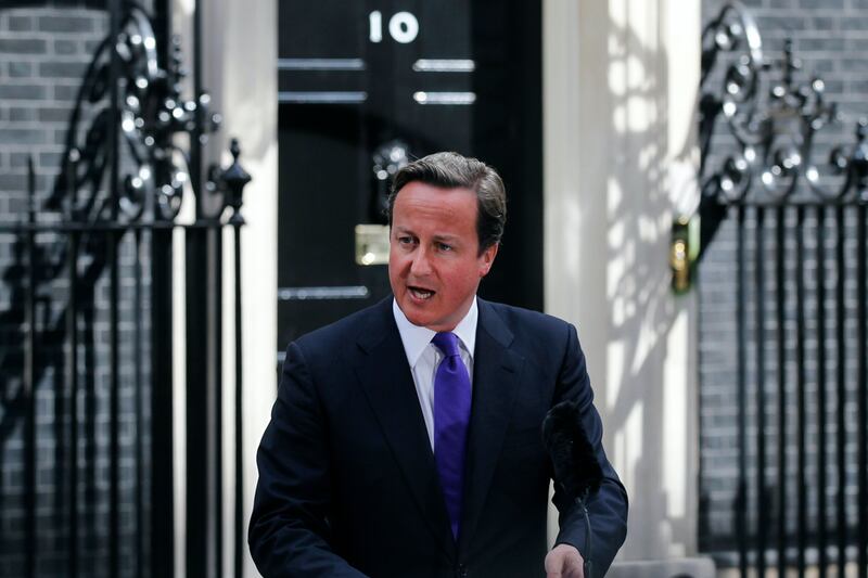 articles/2011/09/02/prime-minister-david-cameron-more-popular-after-london-riots-libya/cameron-no-holiday-underhill_zazqlt