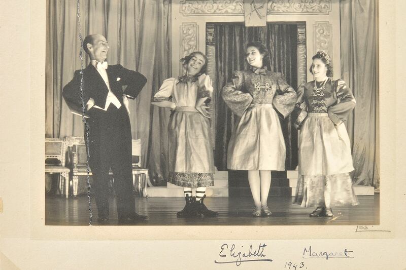 articles/2013/12/03/amazing-pictures-of-future-queen-cross-dressing-in-teenage-pantomime-role-go-on-sale/royal-panto-tease_aqhfzq