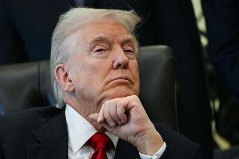 US President Donald Trump looks on during an event about pharmaceutical drugs in the Oval Office of the White House in Washington, DC on November 6, 2025.
