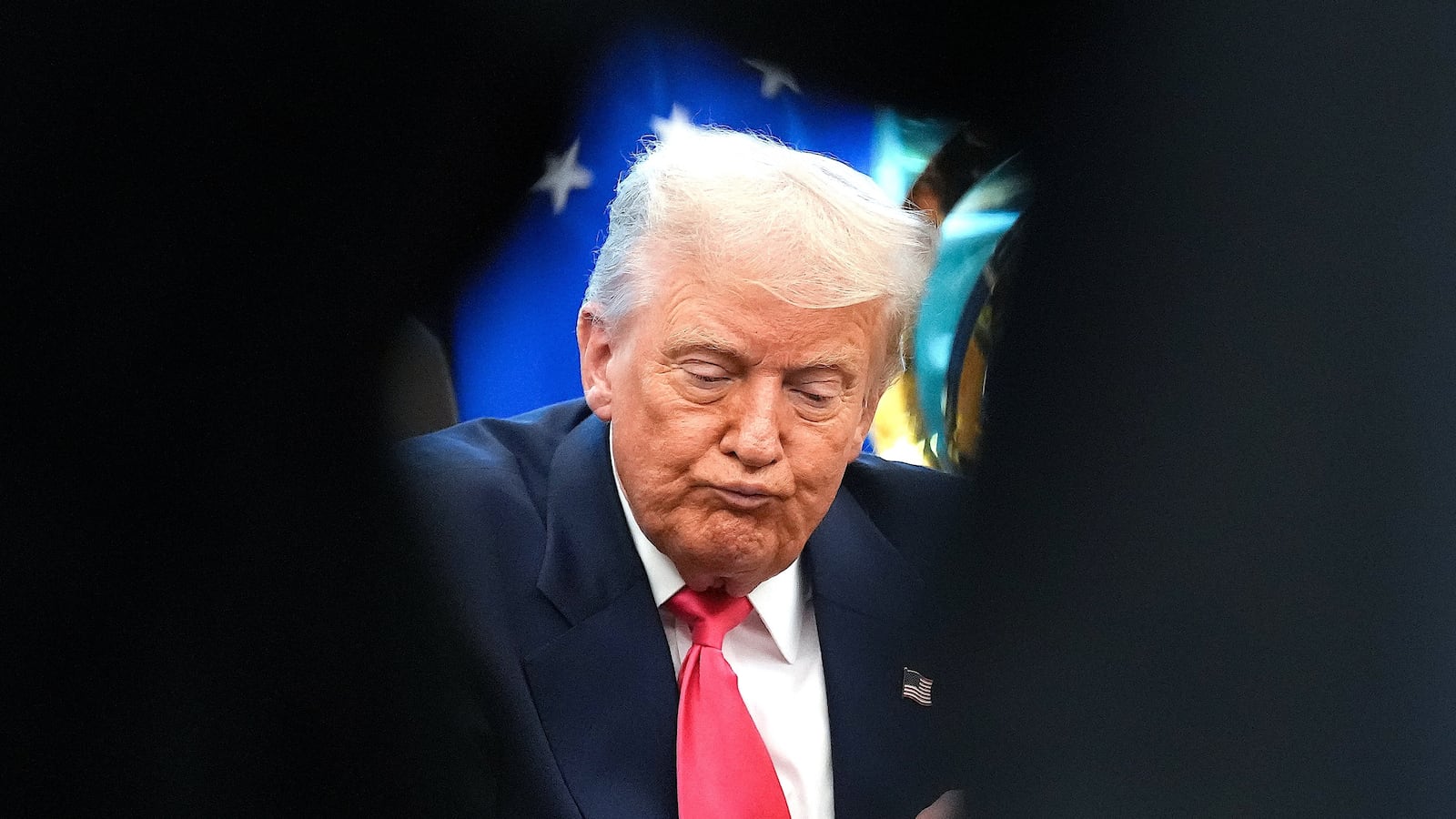 U.S. President Donald Trump answers questions from reporters