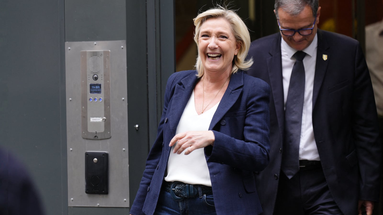 Marine Le Pen laughing.