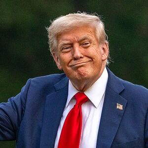 WASHINGTON, DC - JULY 13:  U.S. President Donald Trump walks on the south lawn of the White House and points up at the new flag on July 13, 2025 in Washington, DC. President Trump and first lady Melania Trump spend the afternoon attending the final match of the FIFA Club World Cup at MetLife Stadium in East Rutherford, New Jersey. (Photo by Tasos Katopodis/Getty Images)
