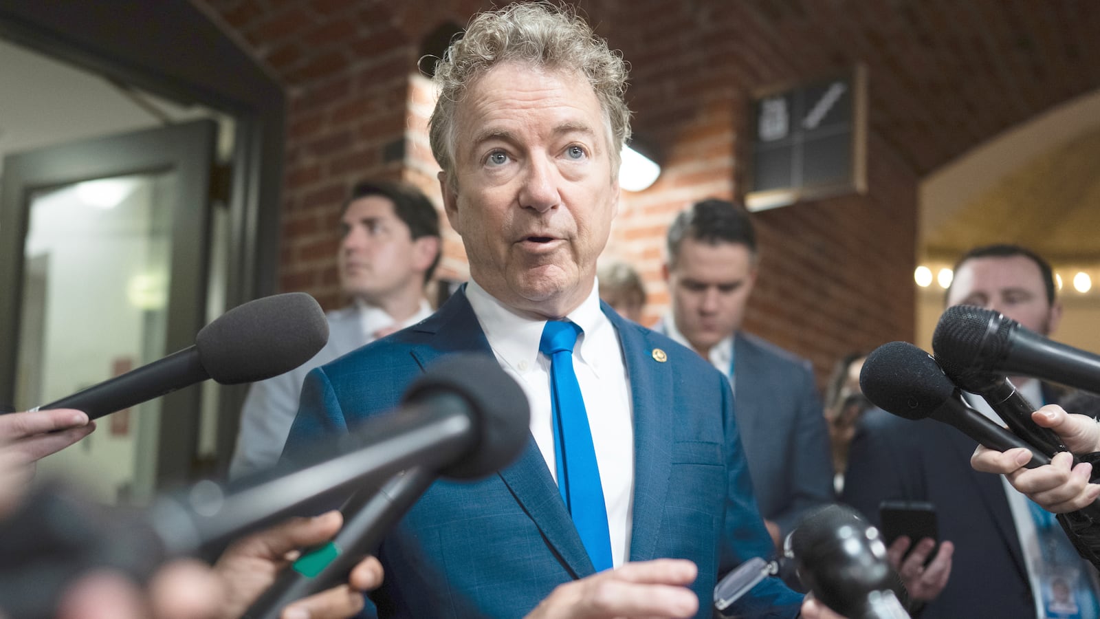 Sen. Rand Paul, R-Ky., talks with reporters in Russell building on Tuesday, June 17, 2025.