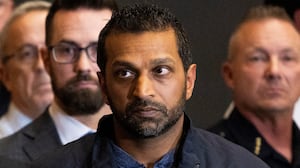 FBI director Kash Patel listens as Utah Department of Public Safety commissioner Beau Mason, left, speaks during a press conference at Utah Valley University