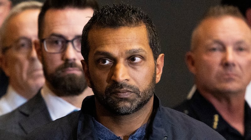 FBI director Kash Patel listens as Utah Department of Public Safety commissioner Beau Mason, left, speaks during a press conference at Utah Valley University
