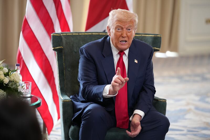 TURNBERRY, SCOTLAND - JULY 28: U.S. President Donald Trump gestures as he meets British Prime Minister Keir Starmer for bilateral talks at Trump Turnberry golf club on July 28, 2025 in Turnberry, Scotland. The pair are meeting at Turnberry before traveling together to Aberdeenshire to have a private dinner at another Trump-owned golf club. President Trump is visiting Scotland in a trip that’s part-vacation, part-work, as he stays at his Trump Turnberry golf course, followed by the Trump International Golf Links in Aberdeenshire, between July 25 to 29.  (Photo by Andrew Harnik/Getty Images)