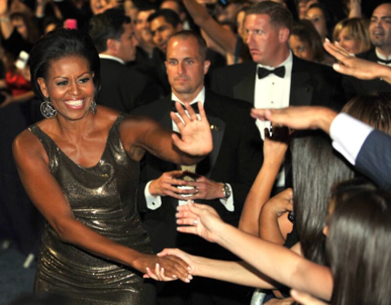 articles/2010/10/07/michelle-obama-named-most-powerful-woman-by-forbes/varadarajan-michelle-hillary_132094_lwy5xi