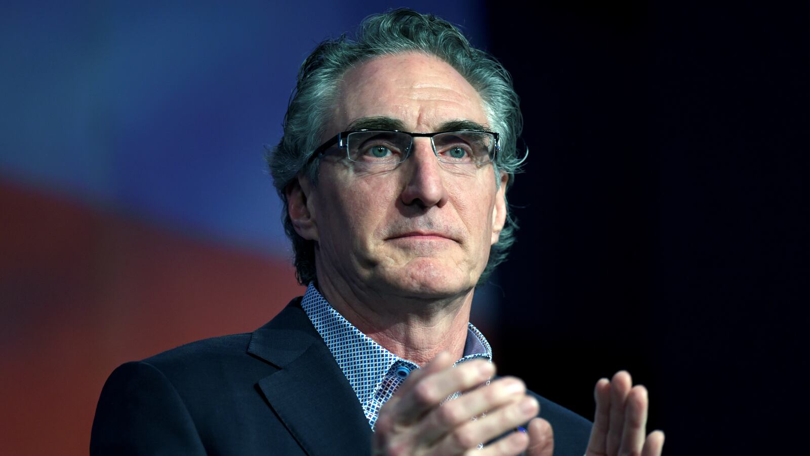 Gov. Doug Burgum (R-ND) speaks to delegates at the Republican State Convention in Grand Forks, North Dakota, April 7, 2018.