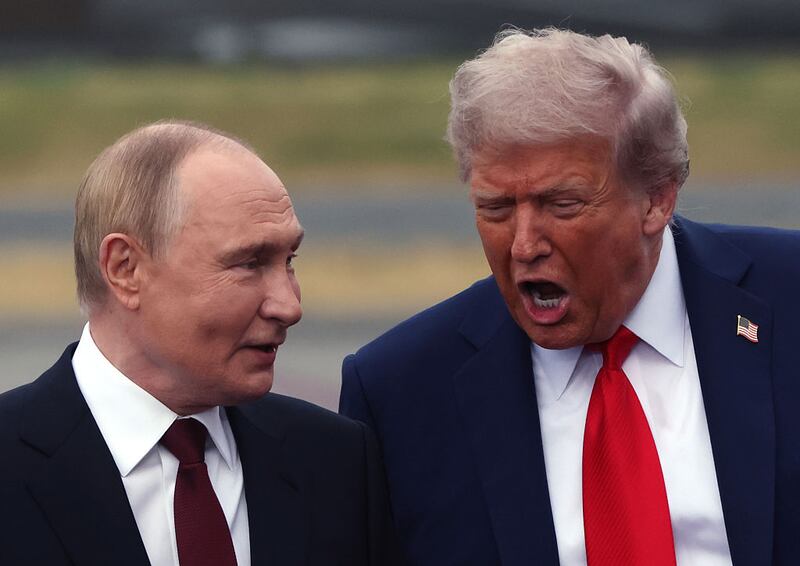 U.S. President Donald Trump welcomes Russian President Vladimir Putin to Joint Base Elmendorf-Richardson on August 15, 2025 in Anchorage, Alaska. The two leaders are meeting for peace talks aimed at ending the war in Ukraine.