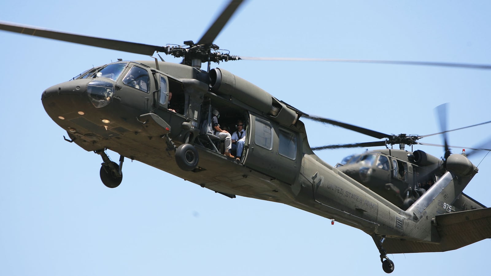 A National Guard Blackhawk helicopter carrying Florida Gov. Charlie Crist prepares to land at the command post at Malabar Fire Station 99, Tuesday, May 13, 2008. (Photo by Ricardo Ramirez Buxeda/Orlando Sentinel/Tribune News Service via Getty Images)