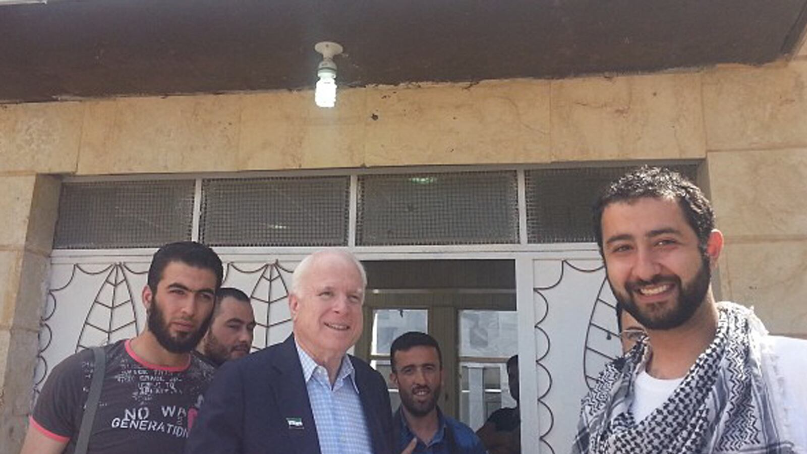articles/2013/05/31/who-was-that-with-mccain-not-syrian-kidnappers-ngos-say/130530-rogin-mccain-tease_wjty8n