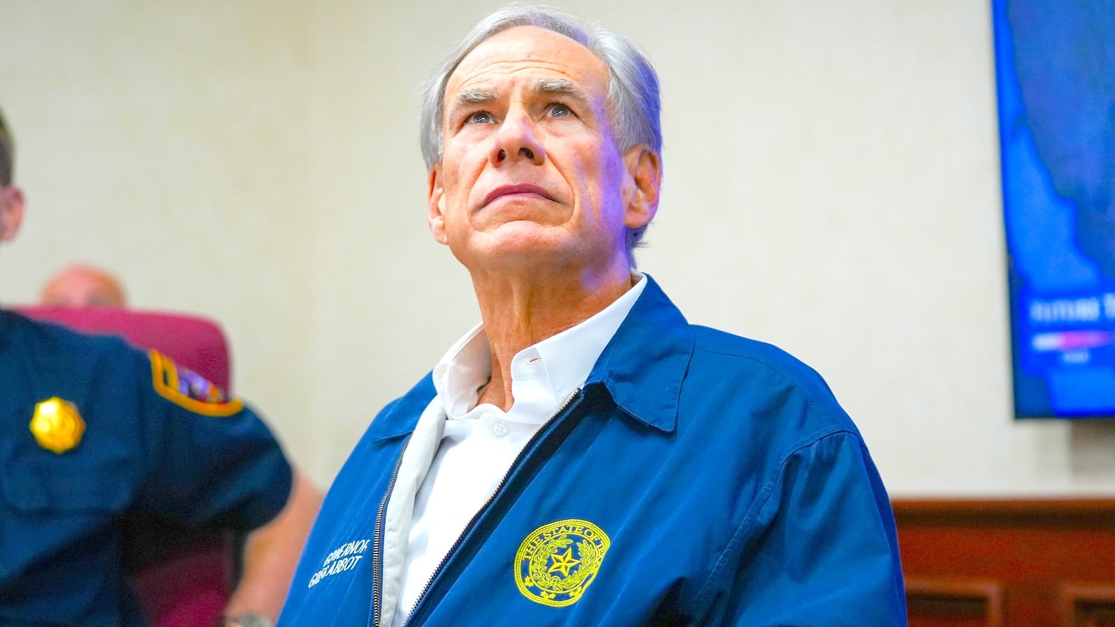 Gov. Greg Abbott listens to a briefing as he prepares for a winter storm at the State Operations Center in Austin on Thursday, Jan. 22, 2026.