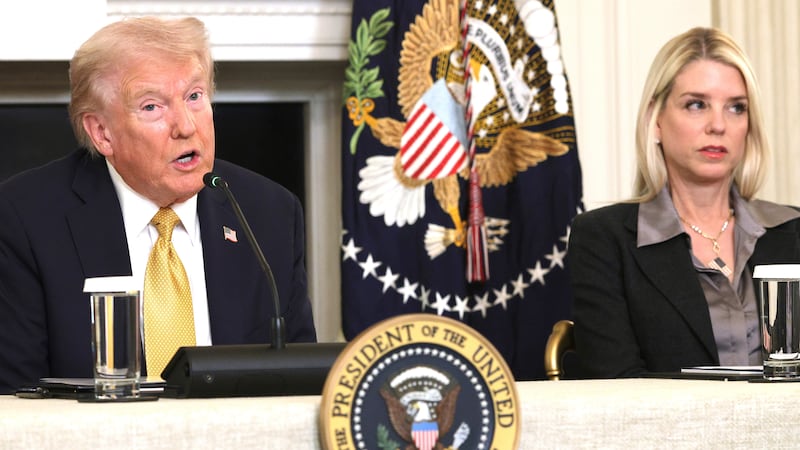 President Donald Trump, joined by Attorney General Pam Bondi