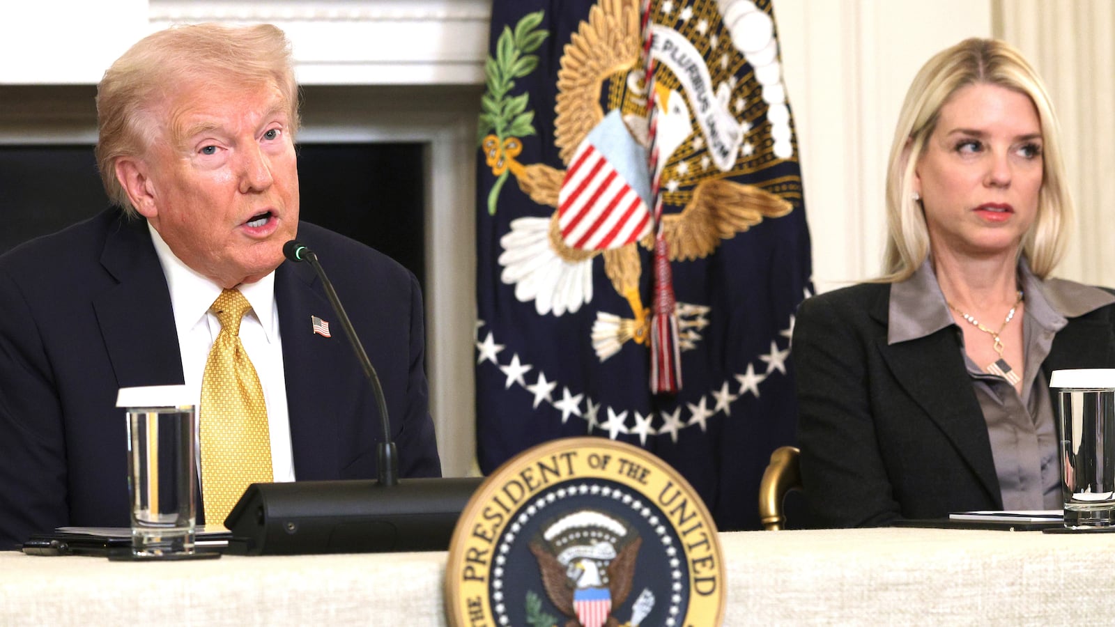 President Donald Trump, joined by Attorney General Pam Bondi