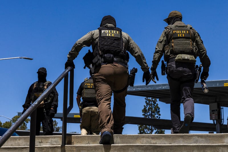 Immigration and Customs Enforcement agents walk outside the Ventura County Government Center in Ventura, California, on July 27, 2026.