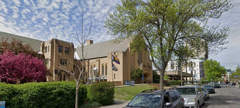 The church, with LGBTQ and 'Black Lives Matter' flags outside.