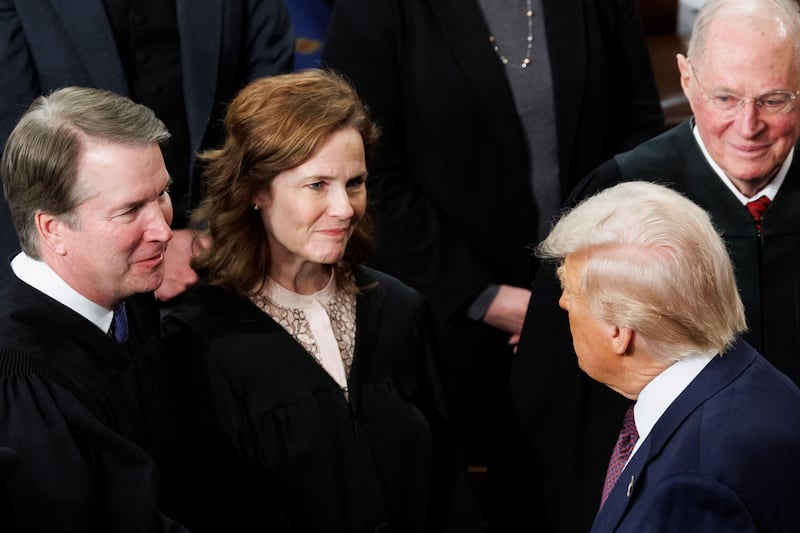 WASHINGTON, MARCH 4: President Donald Trump greets Supreme Court Justices Brett Kavanaugh, Amy Coney Barrett and Stephen Breyer during a joint session of Congress on Capitol Hill in Washington, on March 4, 2025. (Photo by Tom Brenner for The Washington Post via Getty Images)