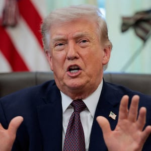 U.S. President Donald Trump speaks during the signing ceremony for an executive order on mail ballots, in the Oval Office of the White House in Washington, D.C., March 31, 2026.